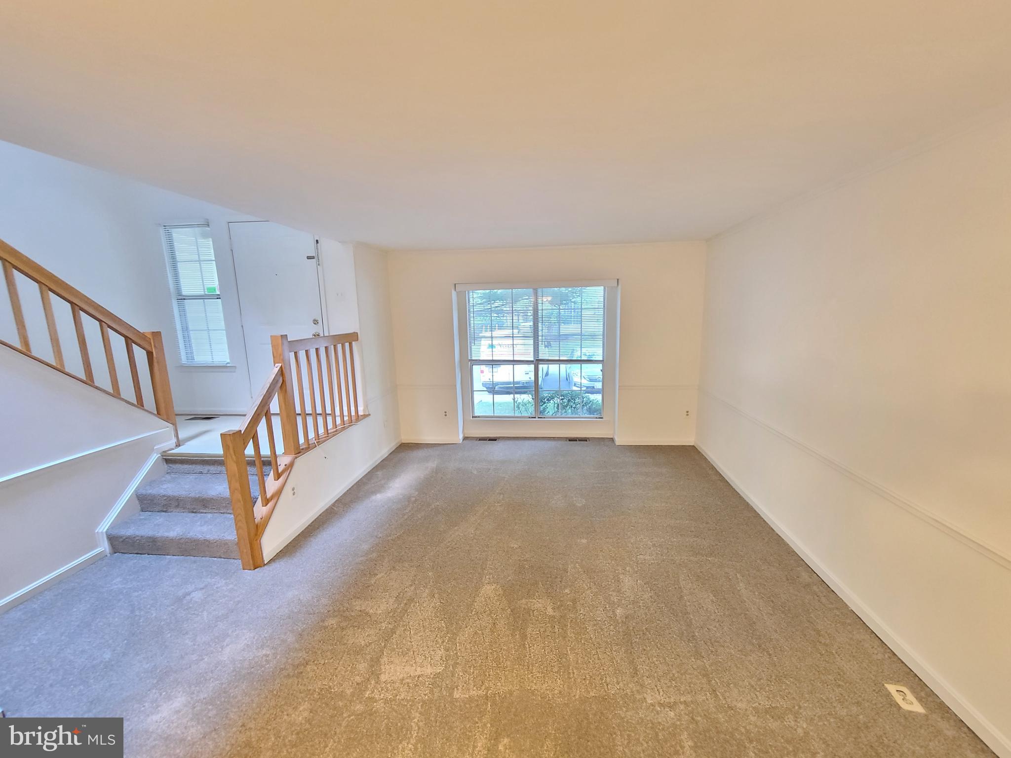 1427 Casino Circle Silver Spring, MD 20906 - Photo 6 of 34 a view of a livingroom with a staircase