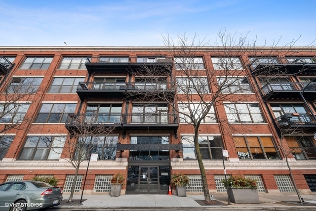 1040 West Adams Street, Unit 610 Chicago, IL 60607 - Photo 1 of 24 a view of a building and a street