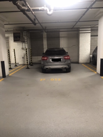 1040 West Adams Street, Unit 610 Chicago, IL 60607 - Photo 20 of 24 a car parked in parking garage