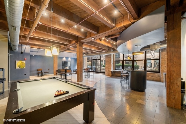 1040 West Adams Street, Unit 610 Chicago, IL 60607 - Photo 23 of 24 a room with pool table and windows