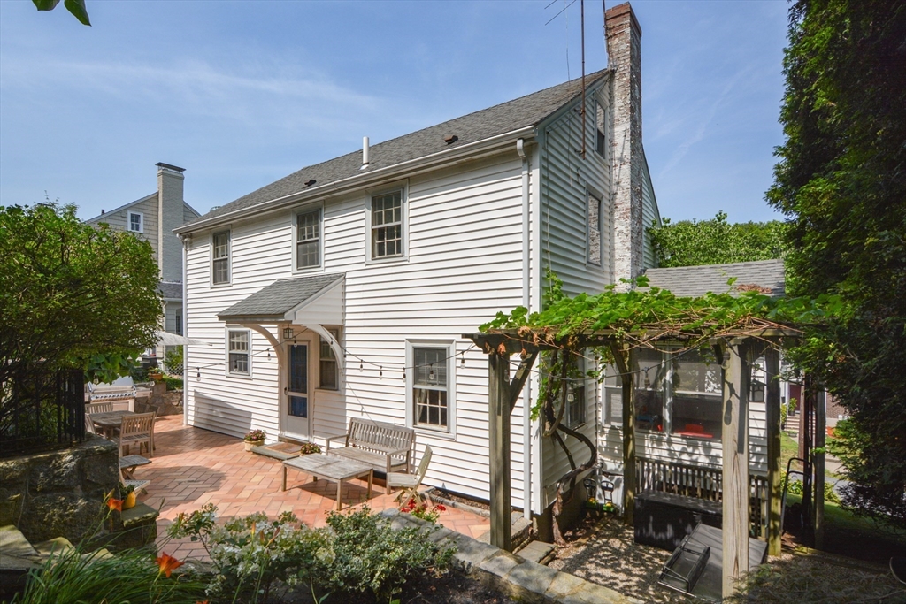 10 Radcliffe Road Belmont, MA 02478 - Photo 18 of 19 a view of a house with a backyard