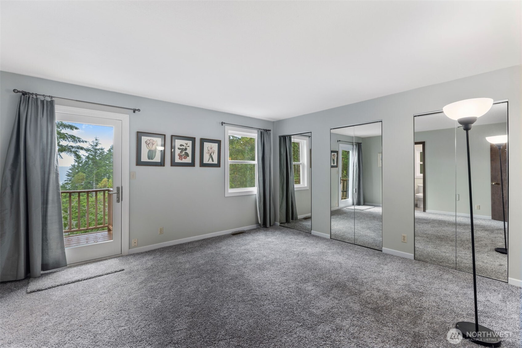 100 East Twanoh Heights Road South Belfair, WA 98528 - Photo 18 of 40 a view of a livingroom with a staircase