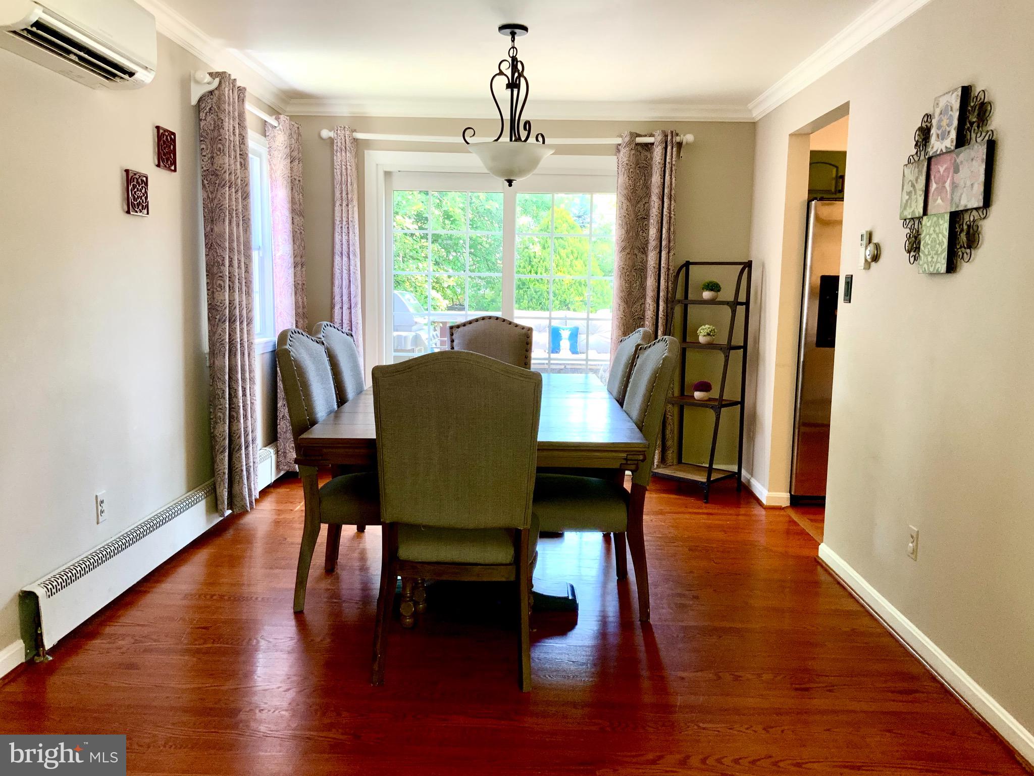 Large dining room leading to rear deck...