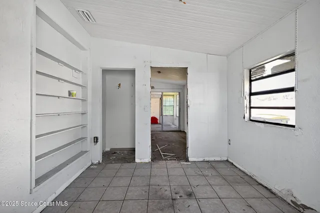 a view of kitchen and utility room