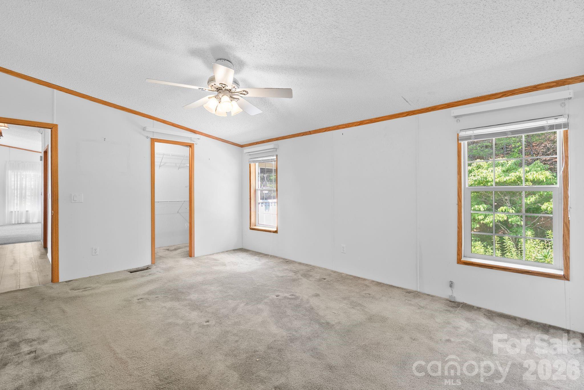 133 Spivey Mountain Road Asheville, NC 28806 - Photo 27 of 40 a view of an empty room with a window