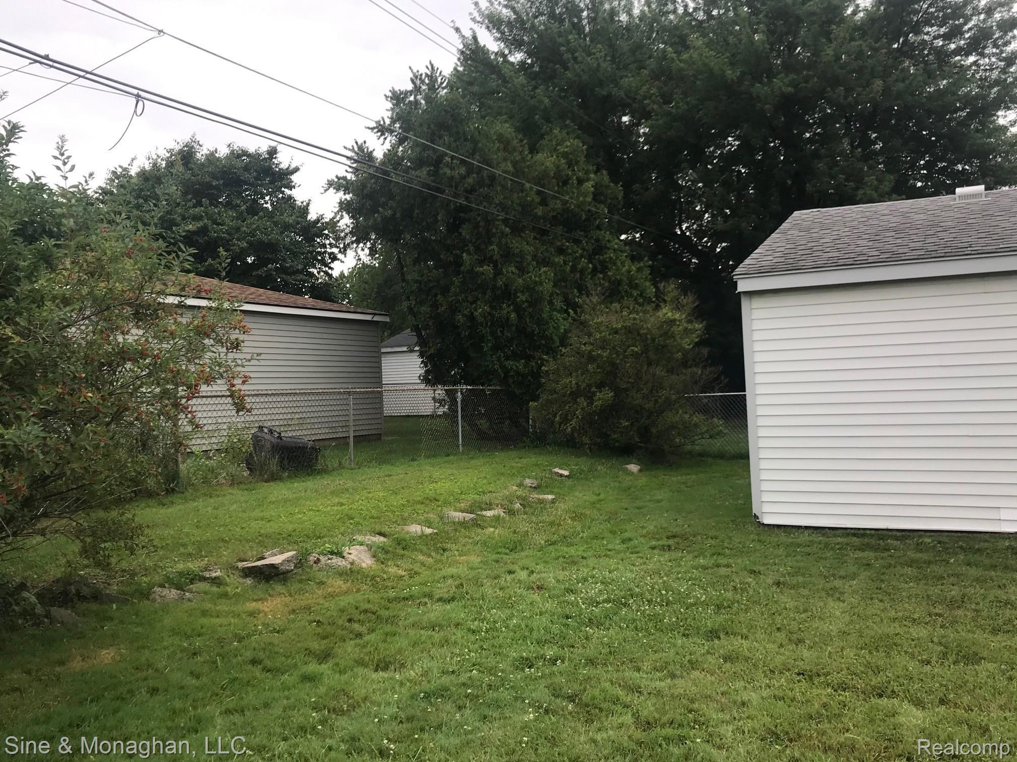 4638 Shell Court Warren, MI 48091 - Photo 23 of 28 4638 SHELL BACKYARD BEHIND GARAGE.jpg
