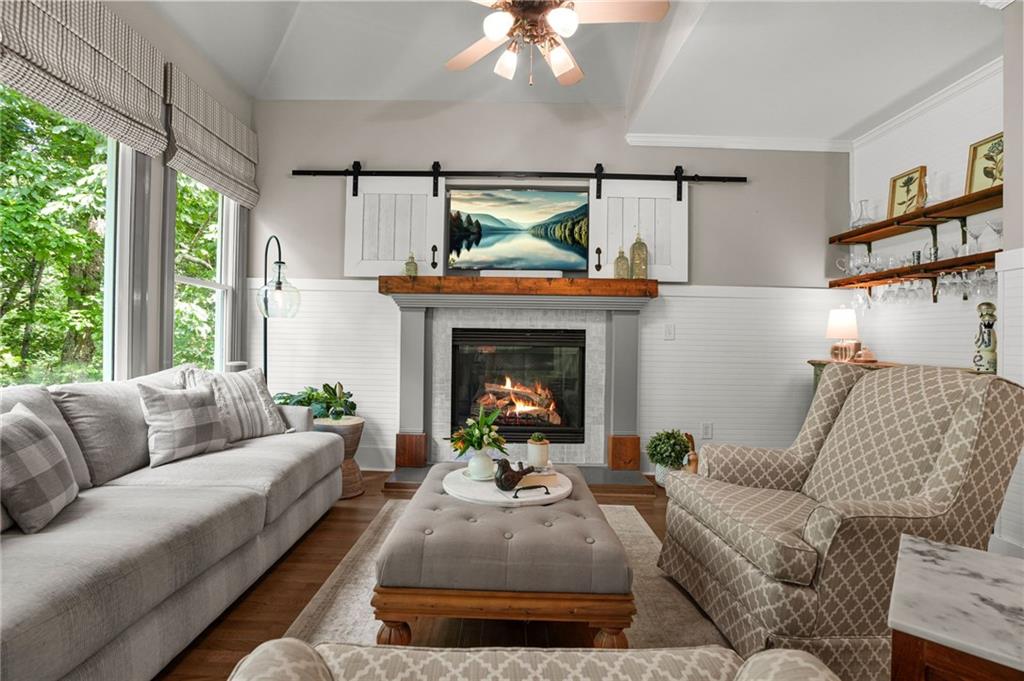 509 Crested Hawk Ridge Canton, GA 30114 - Photo 17 of 89 a living room with furniture and a fireplace