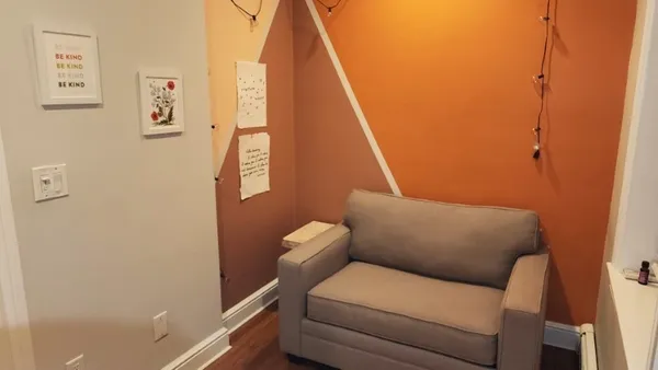 a view of a hallway with washer and dryer