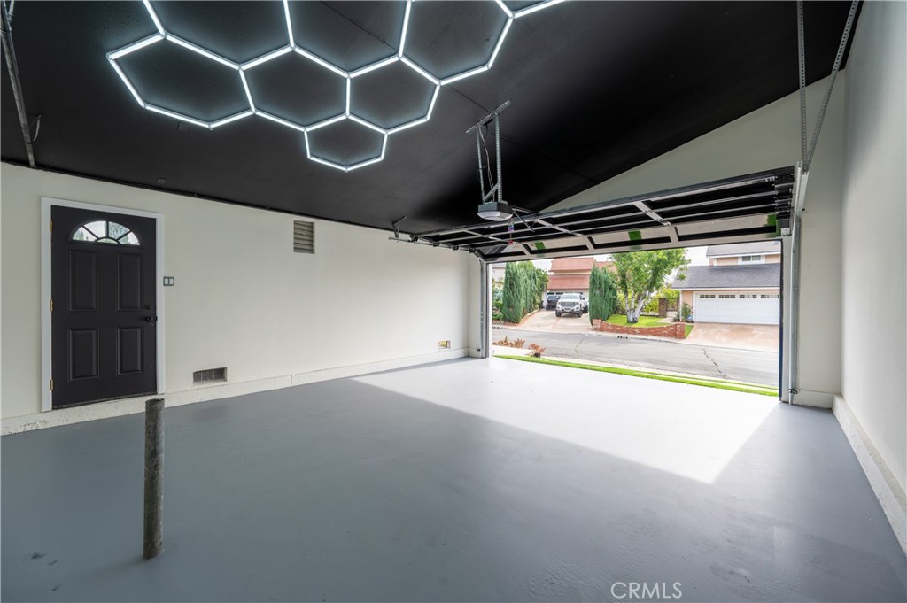 18511 Dylan Street Porter Ranch, CA 91326 - Photo 13 of 22 a view of an empty room with a window