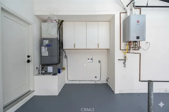 a view of kitchen and utility room