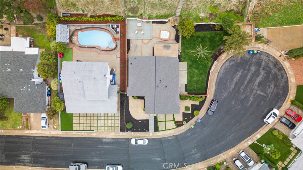 18511 Dylan Street Porter Ranch, CA 91326 - Photo 21 of 22 an aerial view of a house with garden space and parking