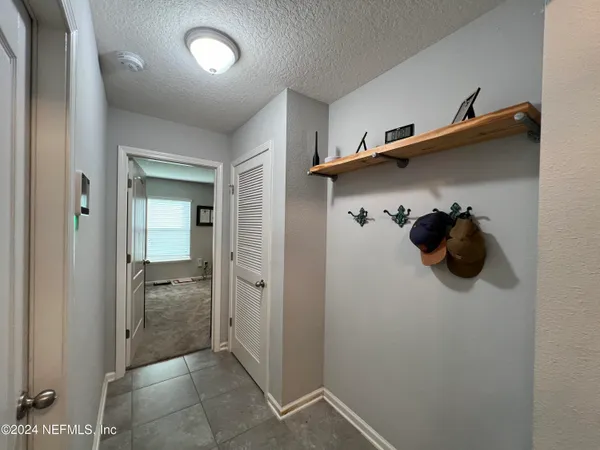 a room with furniture workspace and a window