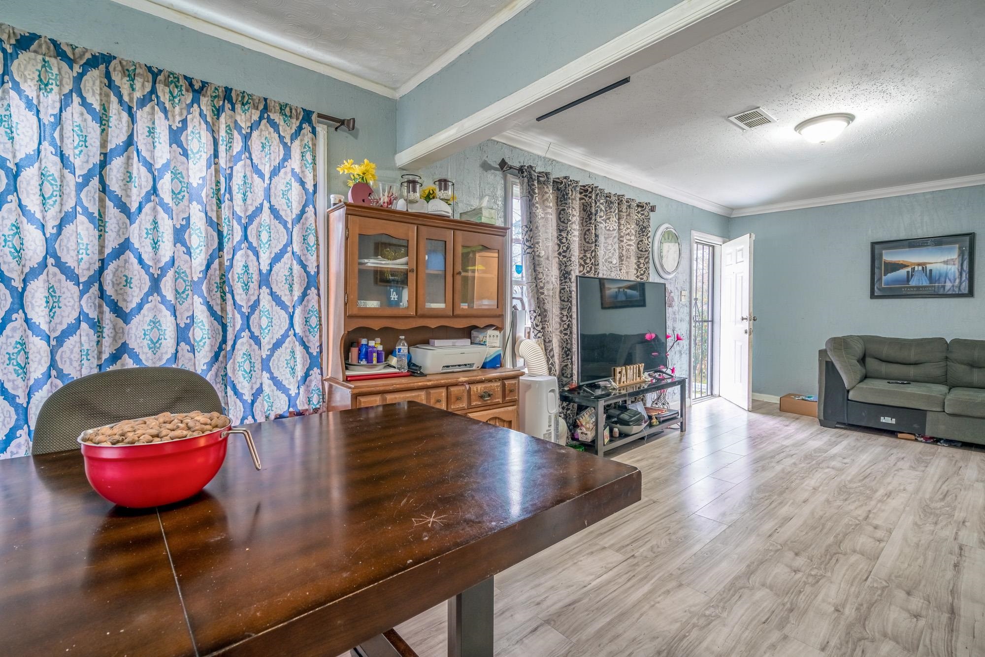 2941 North Radford Road Memphis, TN 38114 - Photo 7 of 25 a living room with furniture and wooden floor