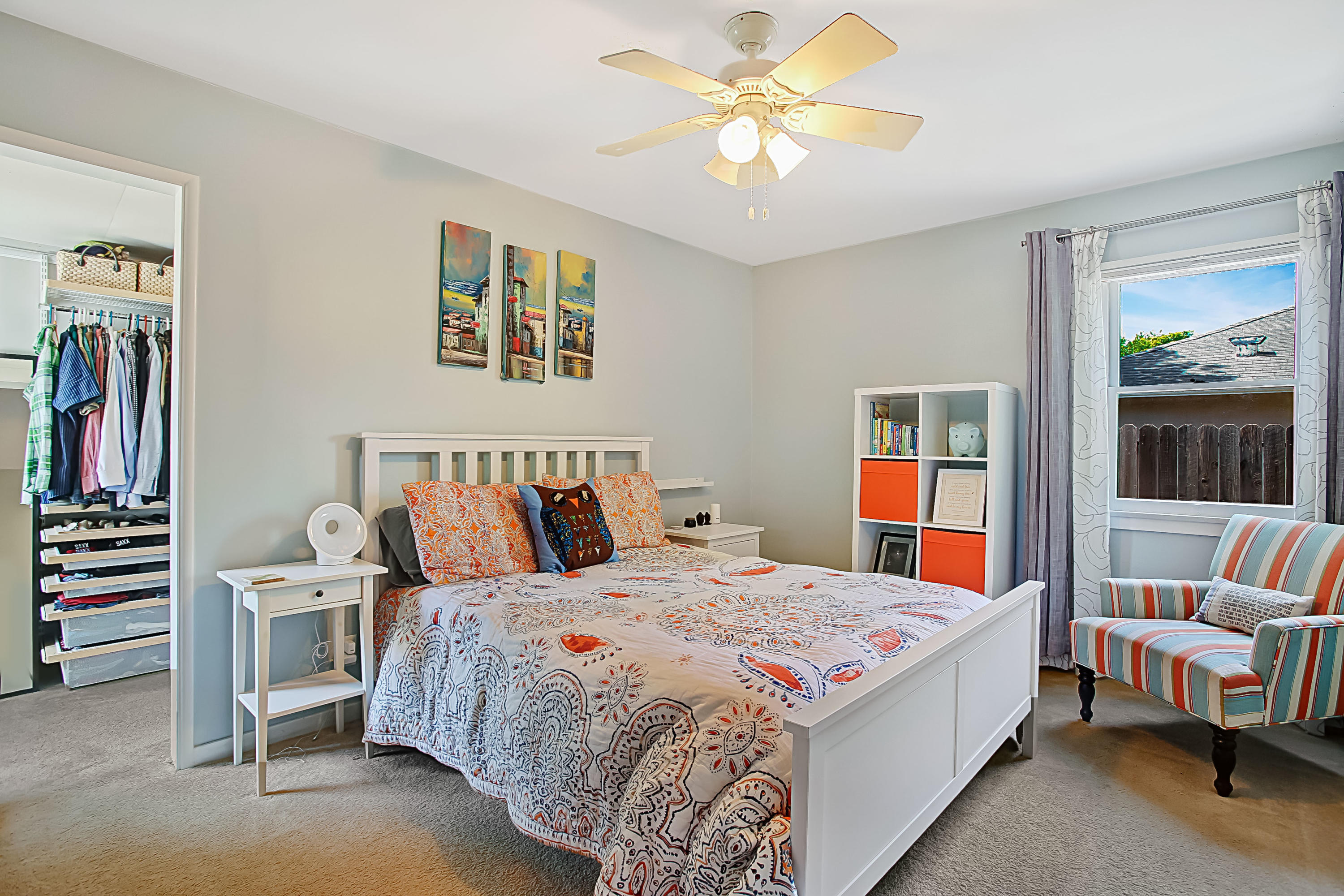 3041 Foothill Road Santa Barbara, CA 93105 - Photo 12 of 25 a bedroom with a bed and a chandelier