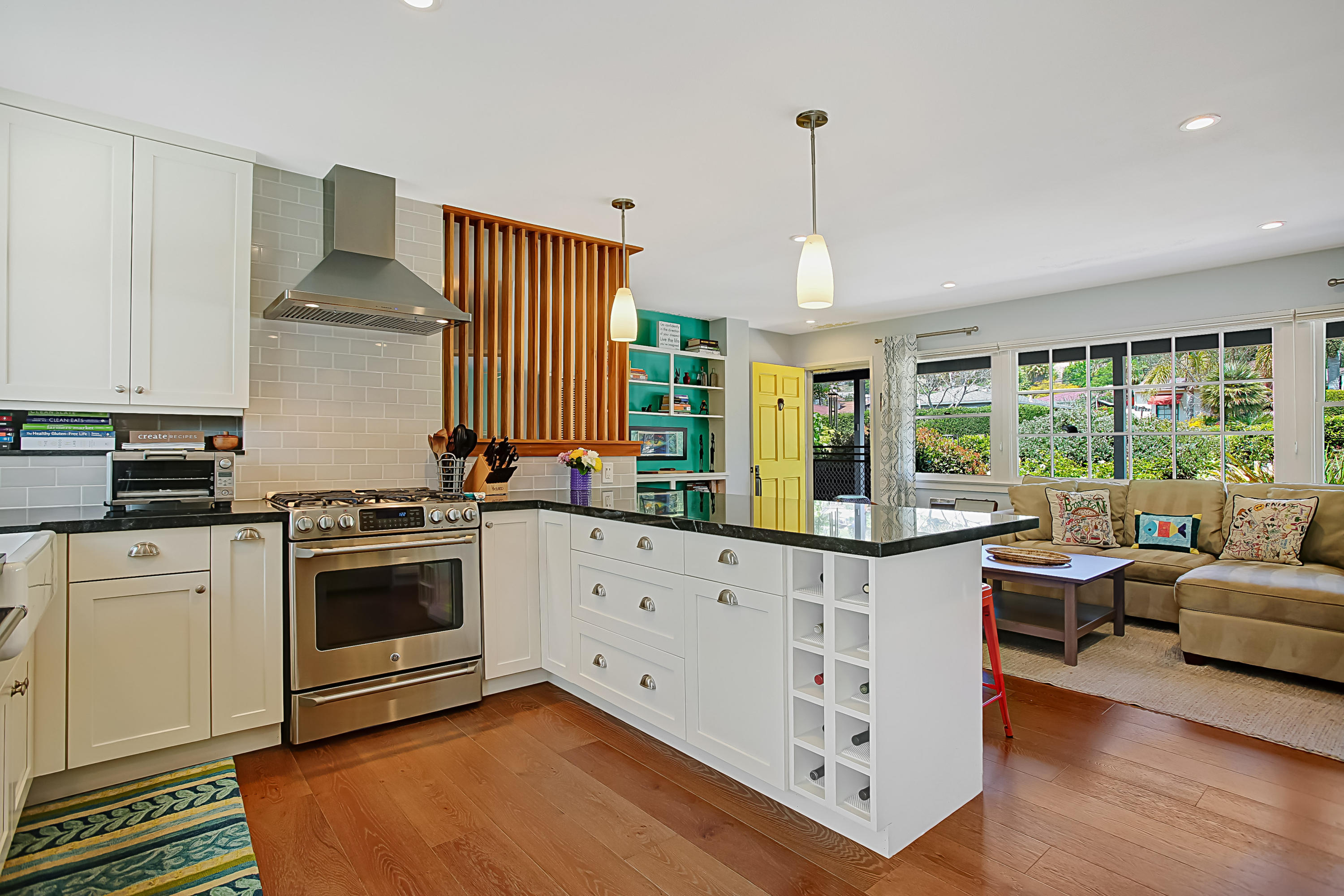 3041 Foothill Road Santa Barbara, CA 93105 - Photo 10 of 25 a kitchen with stainless steel appliances granite countertop a stove and white cabinets