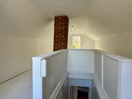 a view of an outdoor sitting area with furniture