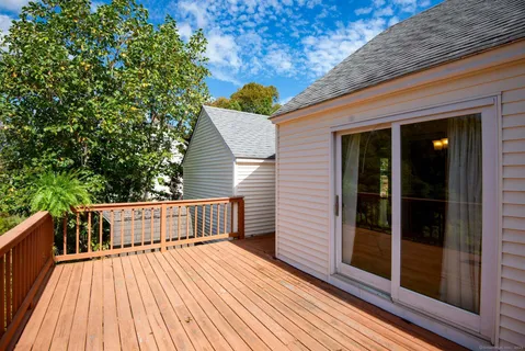 a view of outdoor space with garden and trees