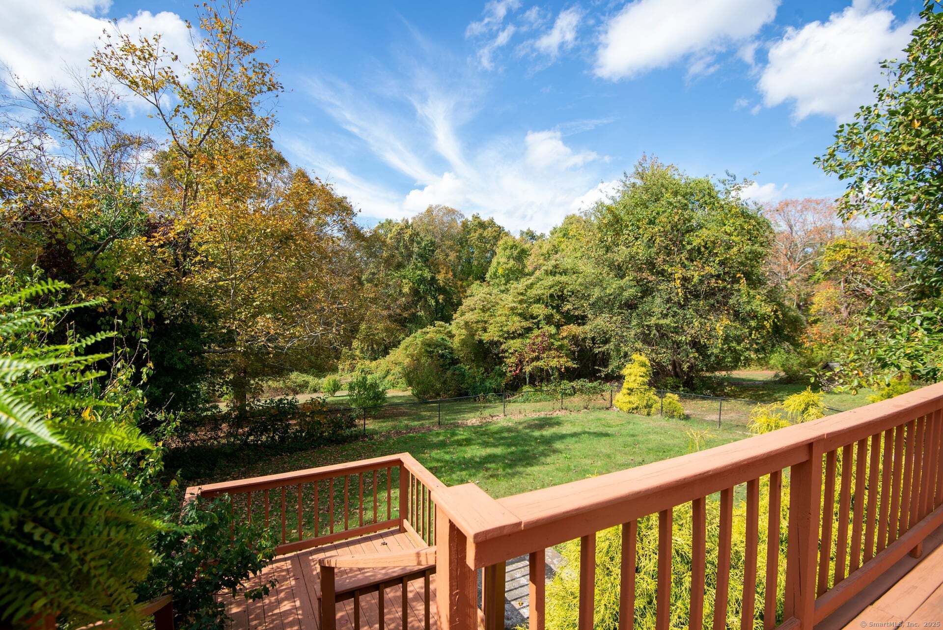 79 Middlesex Avenue Chester, CT 06412 - Photo 20 of 31 a view of a two chairs and table in the balcony