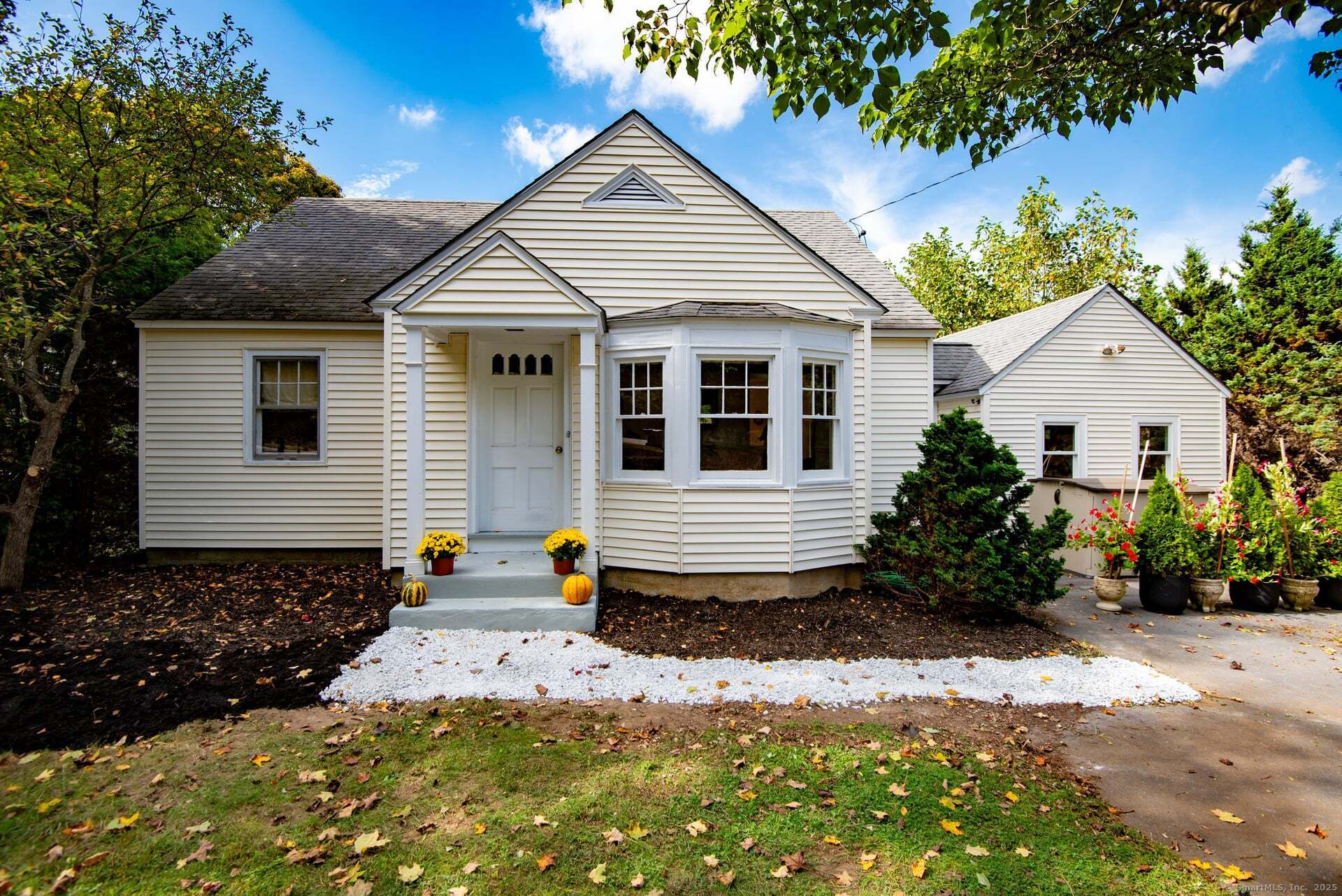 79 Middlesex Avenue Chester, CT 06412 - Photo 2 of 31 a front view of a house with a yard