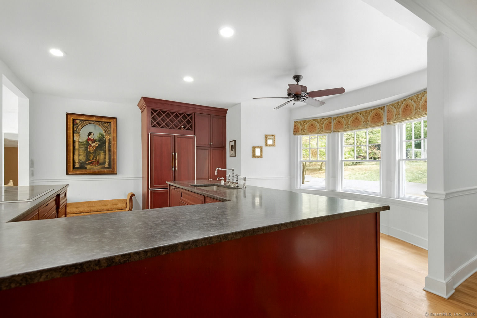 79 Middlesex Avenue Chester, CT 06412 - Photo 8 of 31 a view of a counter top space with furniture and a window