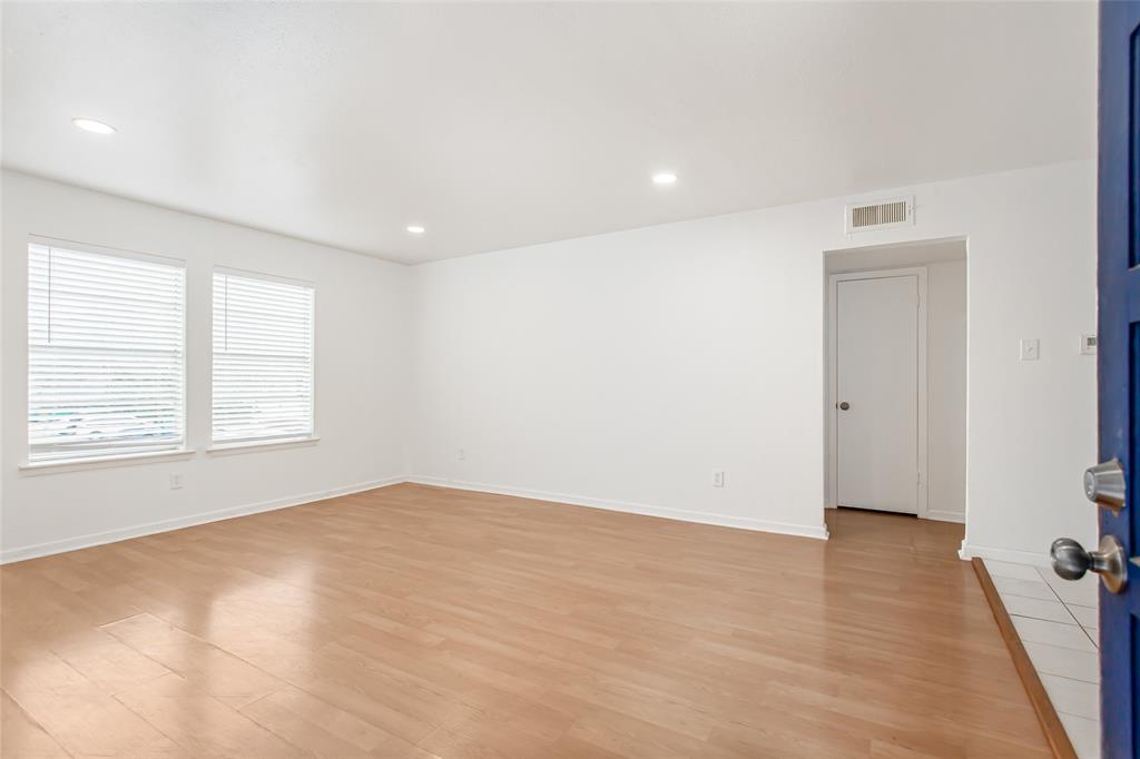 6061 Milton Street, Unit 231 Dallas, TX 75206 - Photo 1 of 27 Bright and spacious living room with updated recessed lighting, neutral finishes, and abundant natural light.