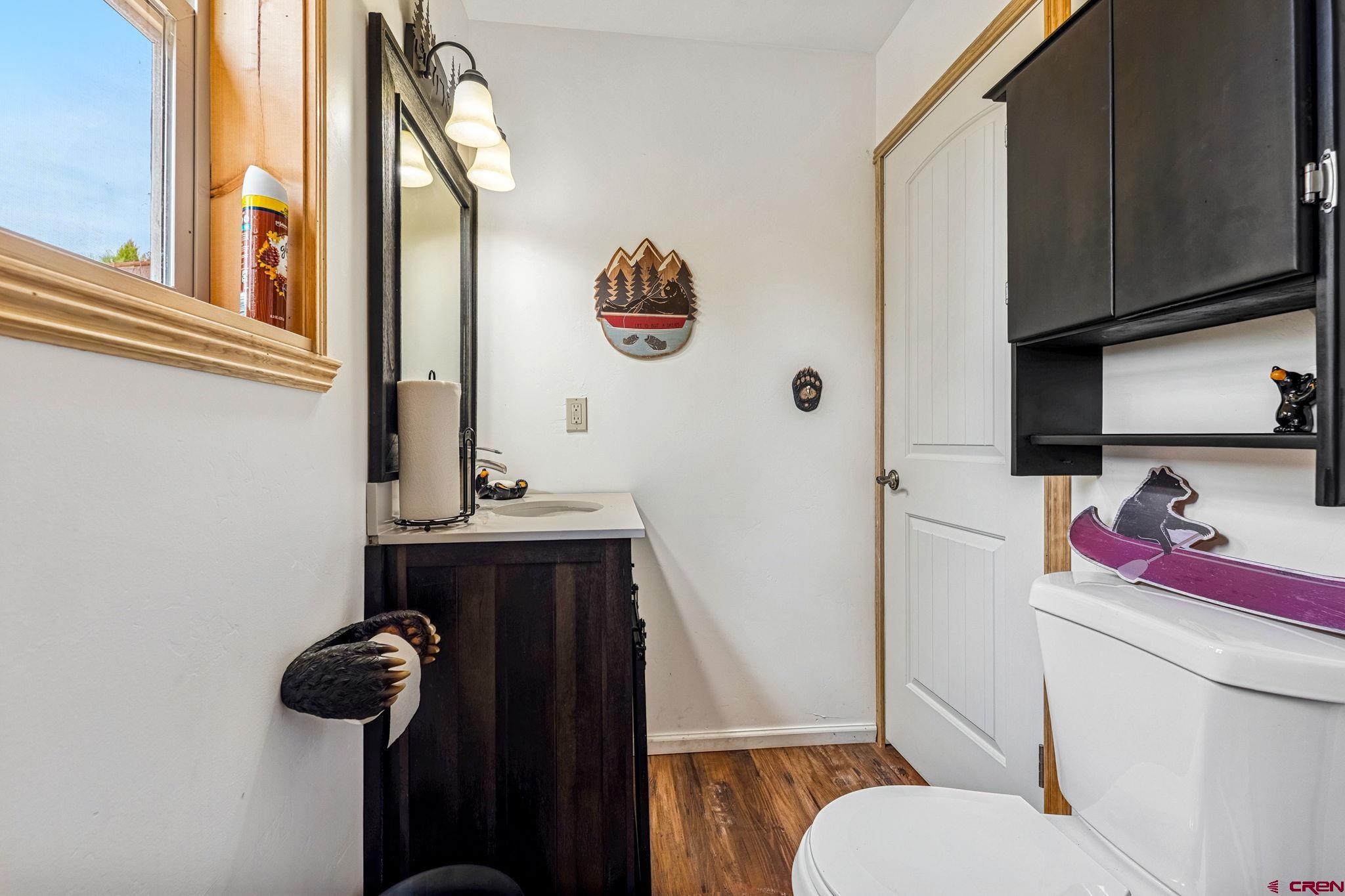 1788 Foxfire Road Bayfield, CO 81122 - Photo 13 of 34 a bathroom with a sink and a mirror