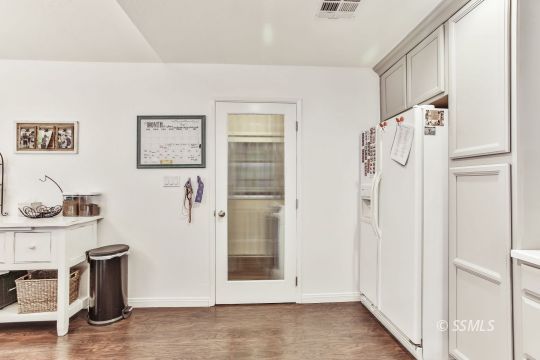 1023 North Norma Street Ridgecrest, CA 93555 - Photo 15 of 32 a view of a livingroom with wooden floor and furniture