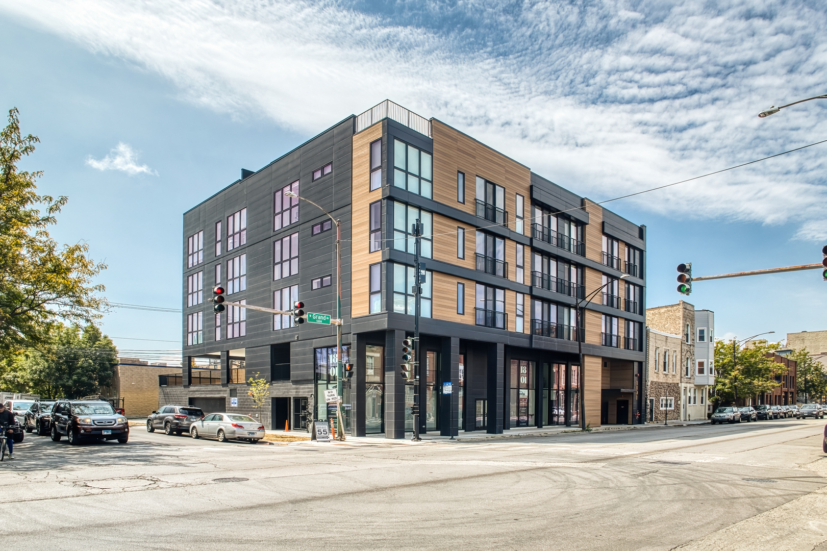 1801 West Grand Avenue, Unit 202 Chicago, IL 60622 - Photo 2 of 18 a front view of a building and a terrace