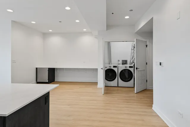 a view of a storage & utility room with a sink
