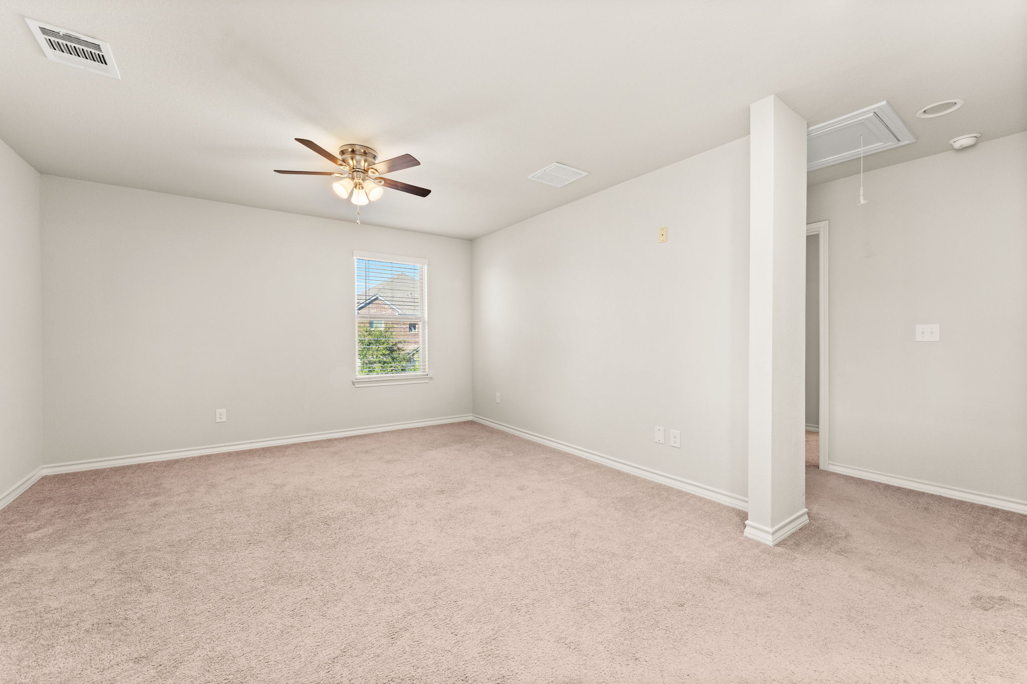 740 Aliso Trail Leander, TX 78641 - Photo 22 of 35 The upstairs game room provides a versatile second living space for lounging or play.