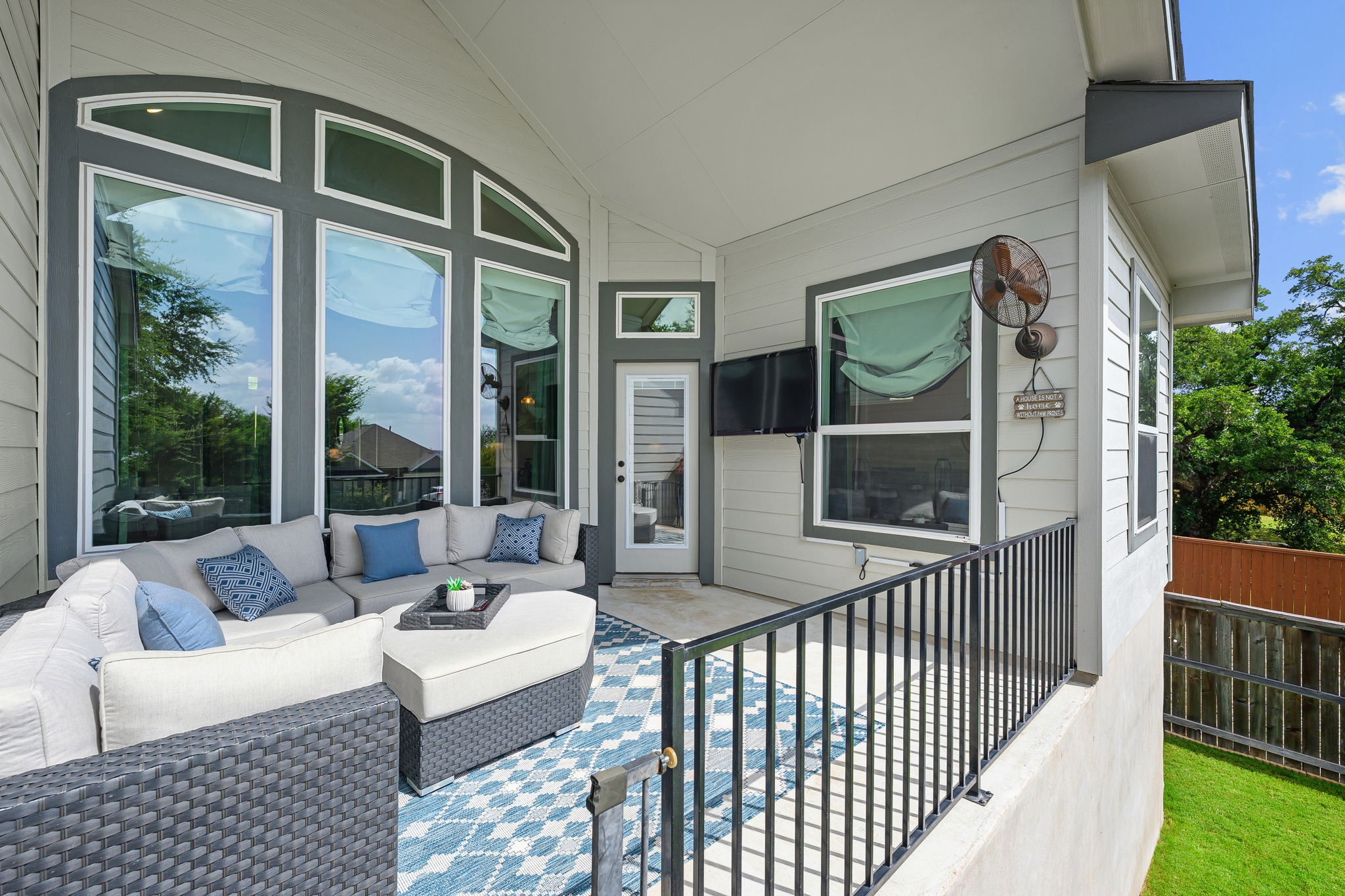 68 Rancho Trail Georgetown, TX 78628 - Photo 24 of 39 An inviting covered patio offers ample room for relaxation and entertaining.