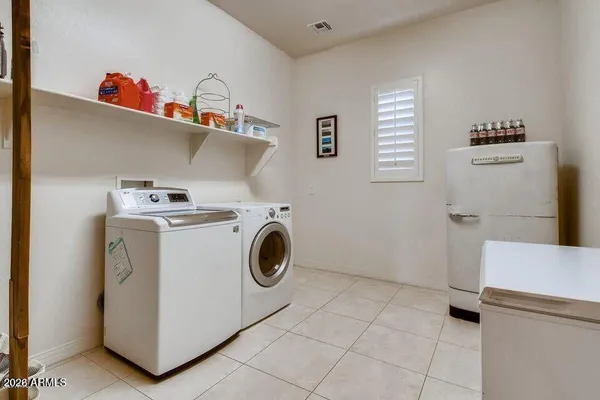 a view of a garage with parked cars