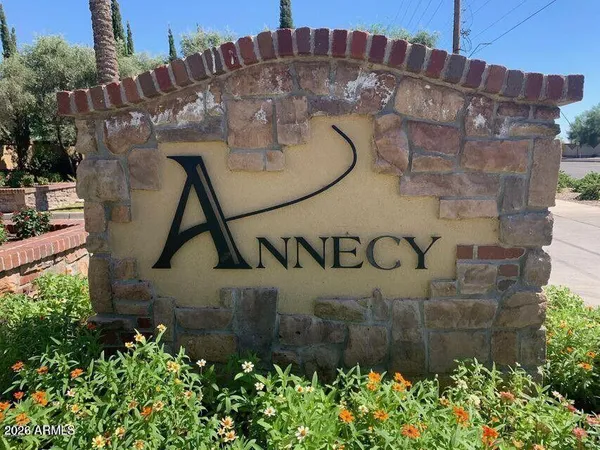 a front view of house with a garden