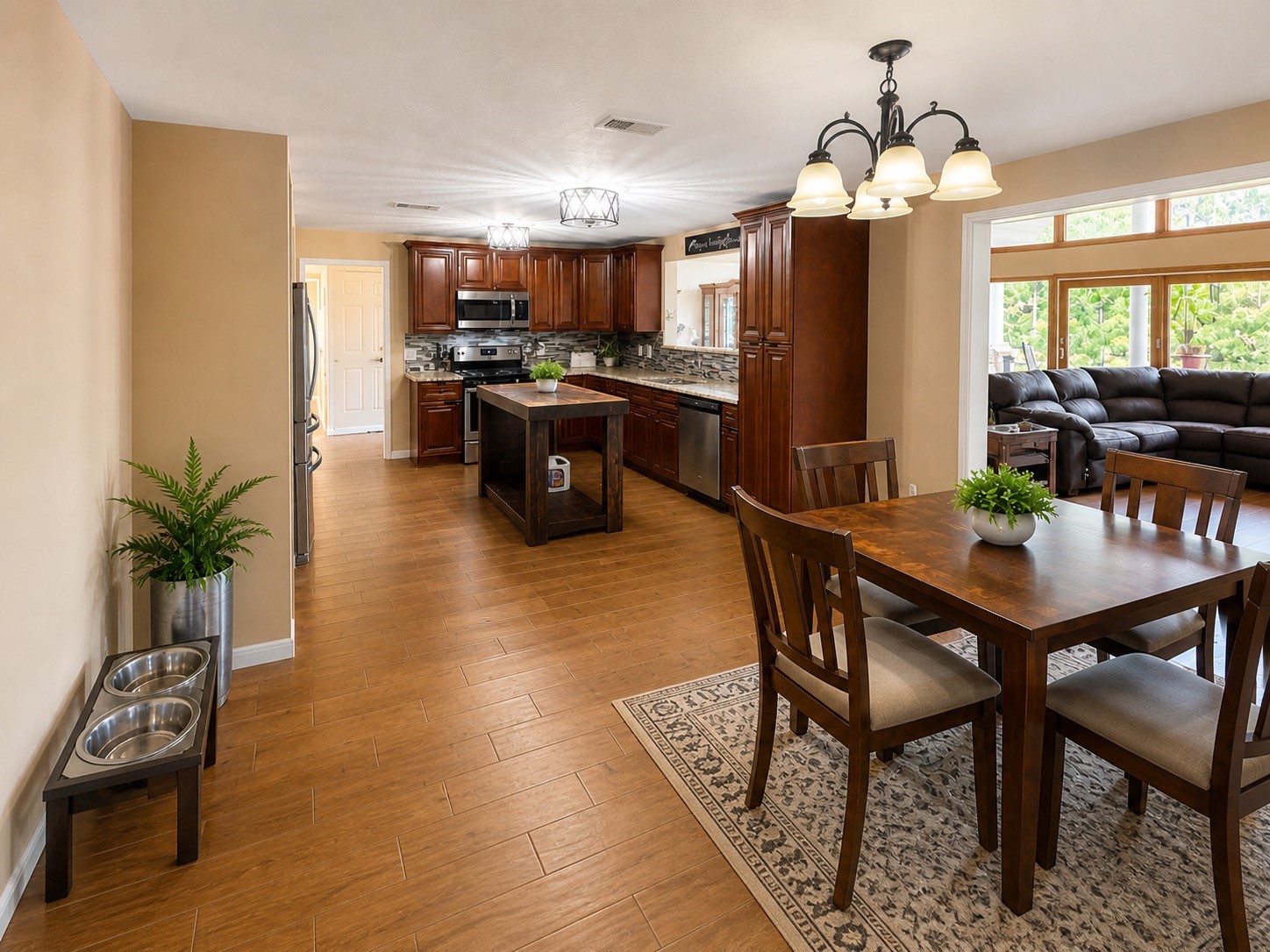 9012 Cooks Lake Road Lumberton, TX 77657 - Photo 5 of 36 a view of a dining room with furniture window and wooden floor