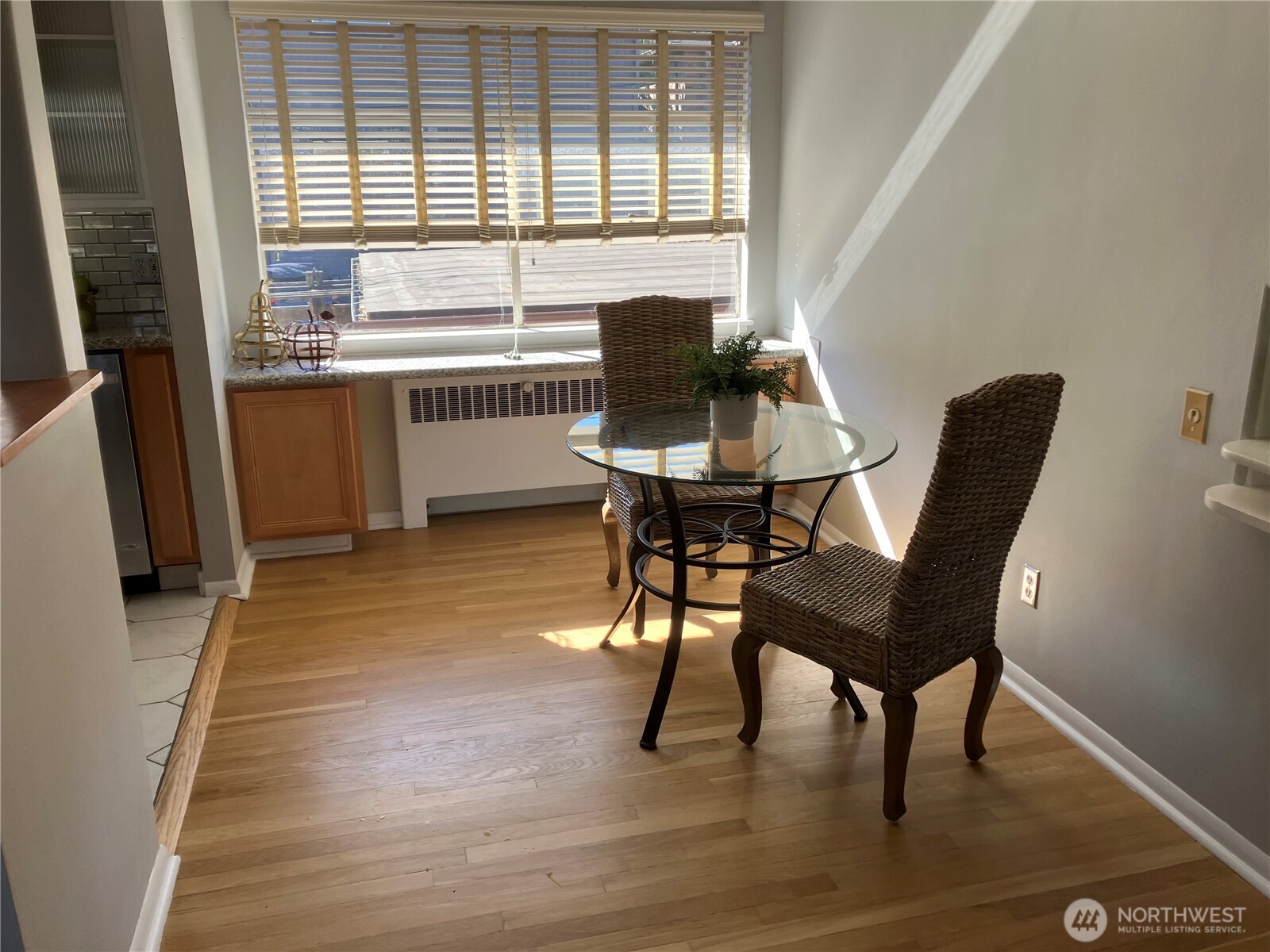 314 North G Street, Unit D2 Tacoma, WA 98403 - Photo 11 of 23 a dining room with furniture and window
