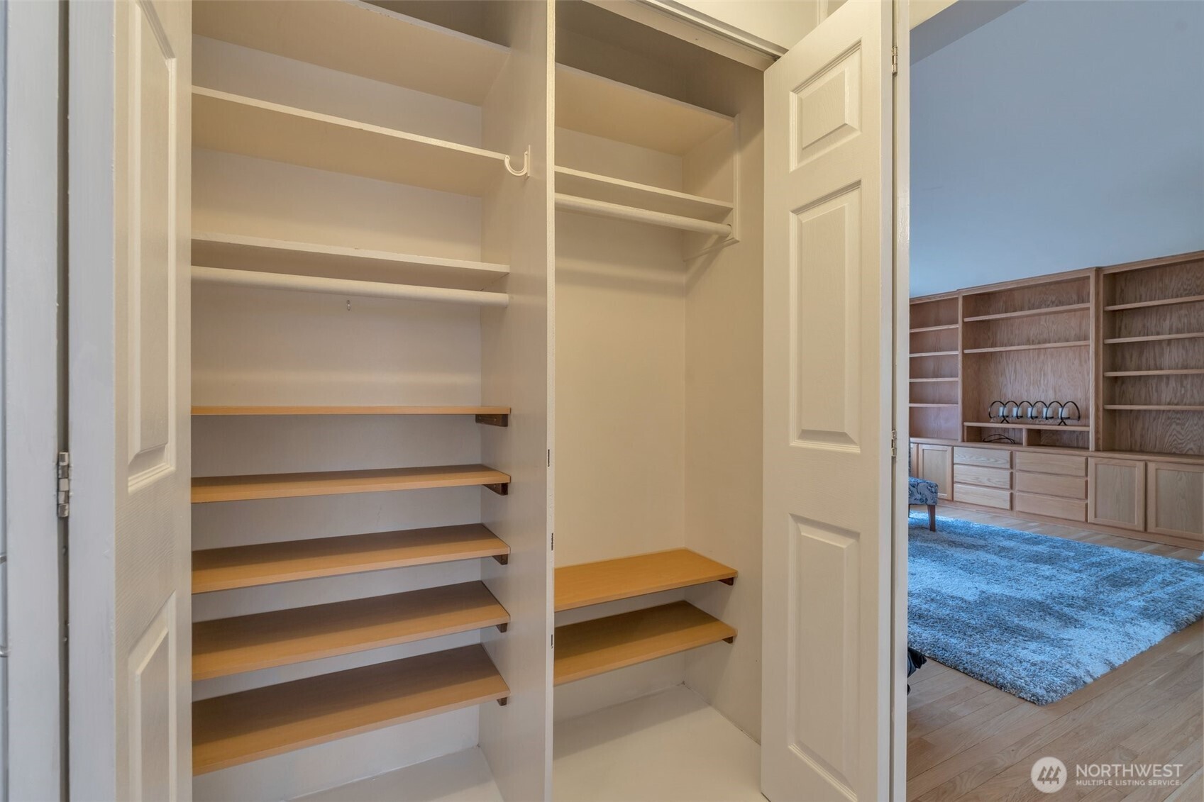 314 North G Street, Unit D2 Tacoma, WA 98403 - Photo 21 of 23 a view of a room with shelves on the wall