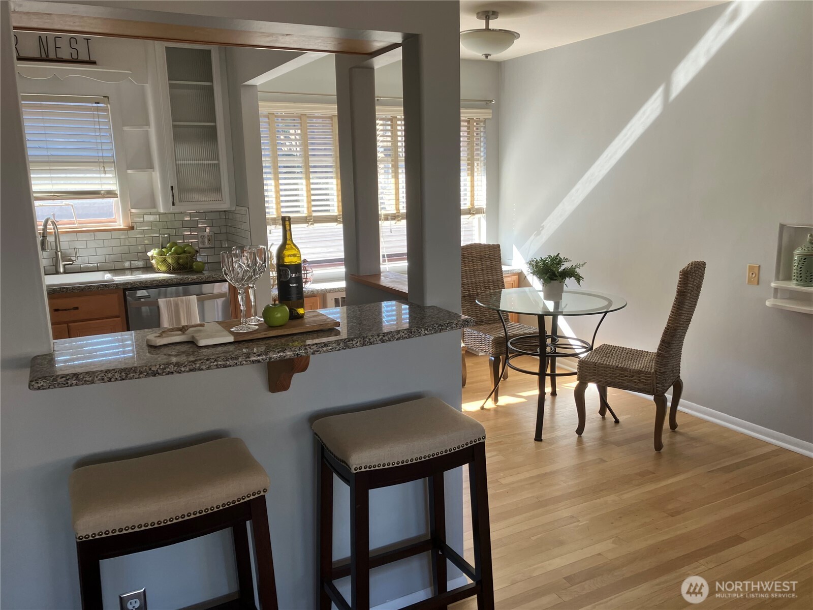 314 North G Street, Unit D2 Tacoma, WA 98403 - Photo 8 of 23 a dining room with furniture and wooden floor
