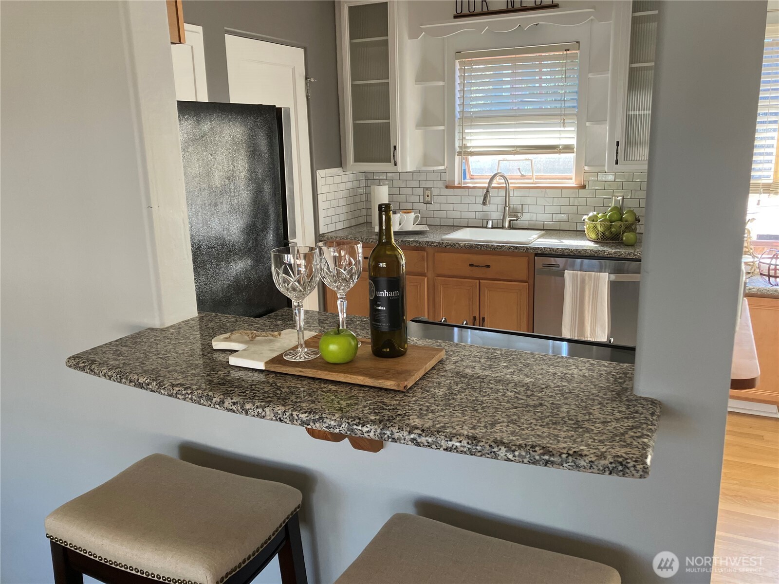 314 North G Street, Unit D2 Tacoma, WA 98403 - Photo 9 of 23 a kitchen with a sink a counter top space and stainless steel appliances
