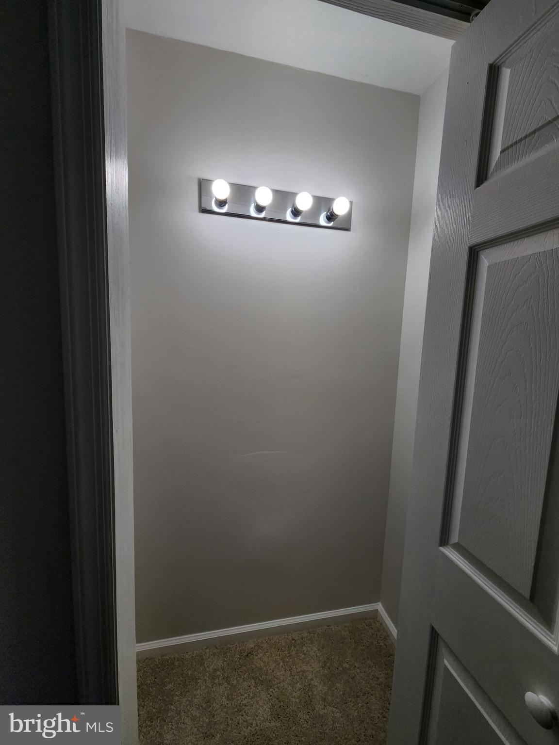 247 Becks Woods Drive Bear, DE 19701 - Photo 27 of 58 a view of a hallway with furniture and chandelier