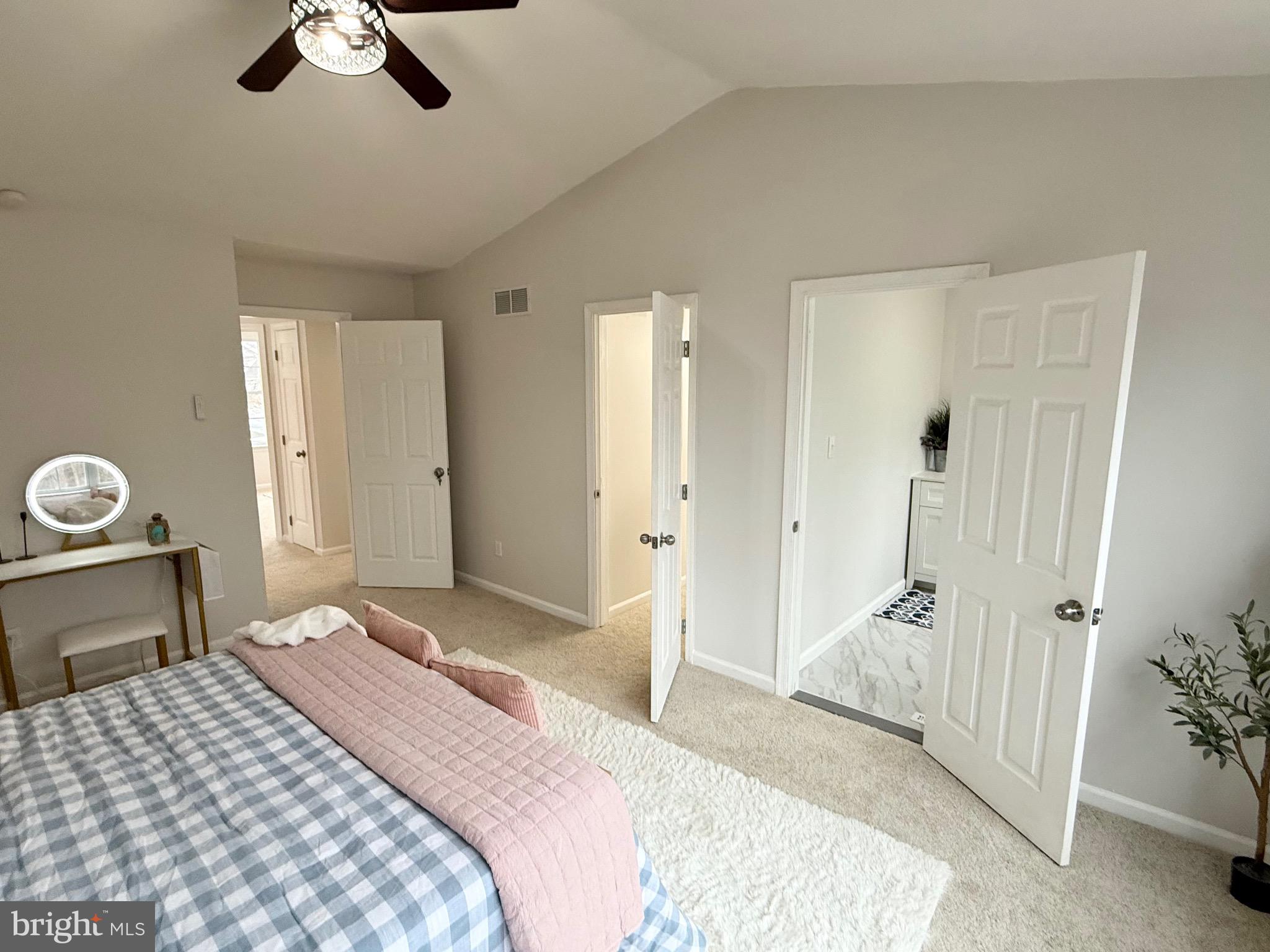 247 Becks Woods Drive Bear, DE 19701 - Photo 29 of 58 a bedroom with a bed and a chandelier