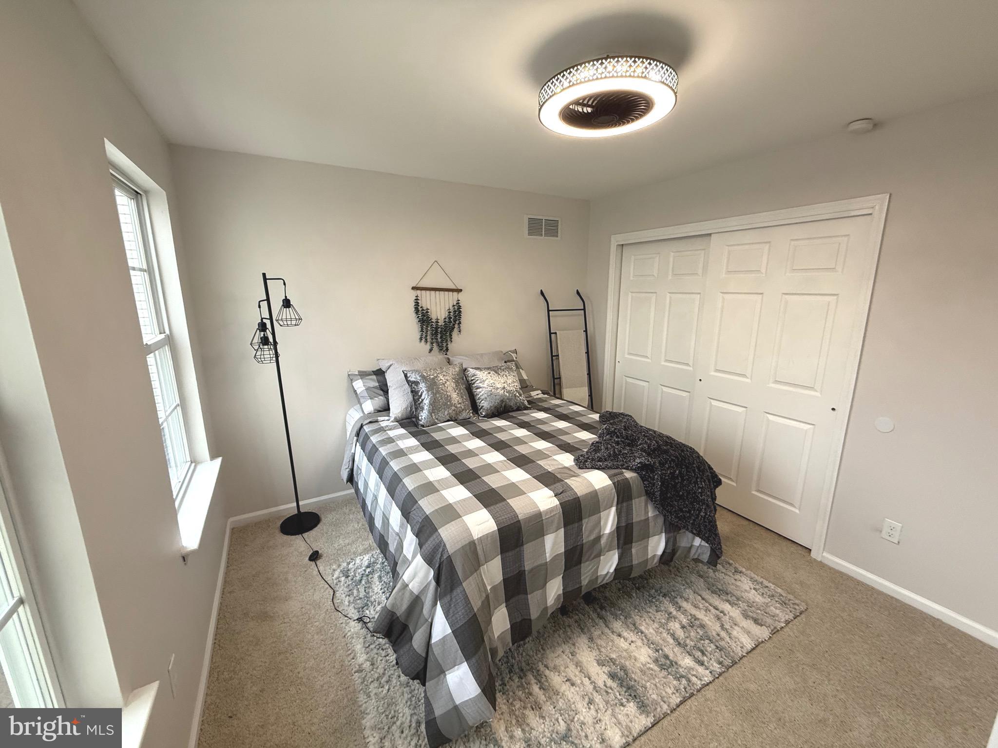 247 Becks Woods Drive Bear, DE 19701 - Photo 36 of 58 a bedroom with a bed and a window