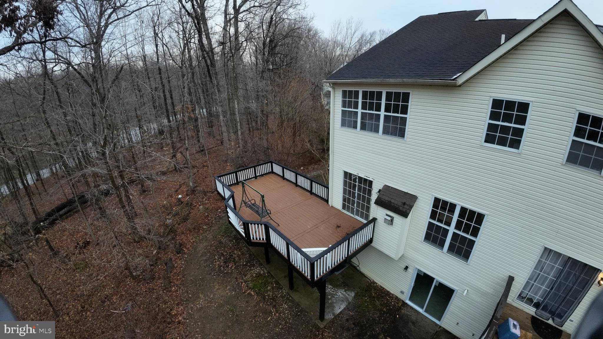 247 Becks Woods Drive Bear, DE 19701 - Photo 52 of 58 a backyard of a house with table and chairs