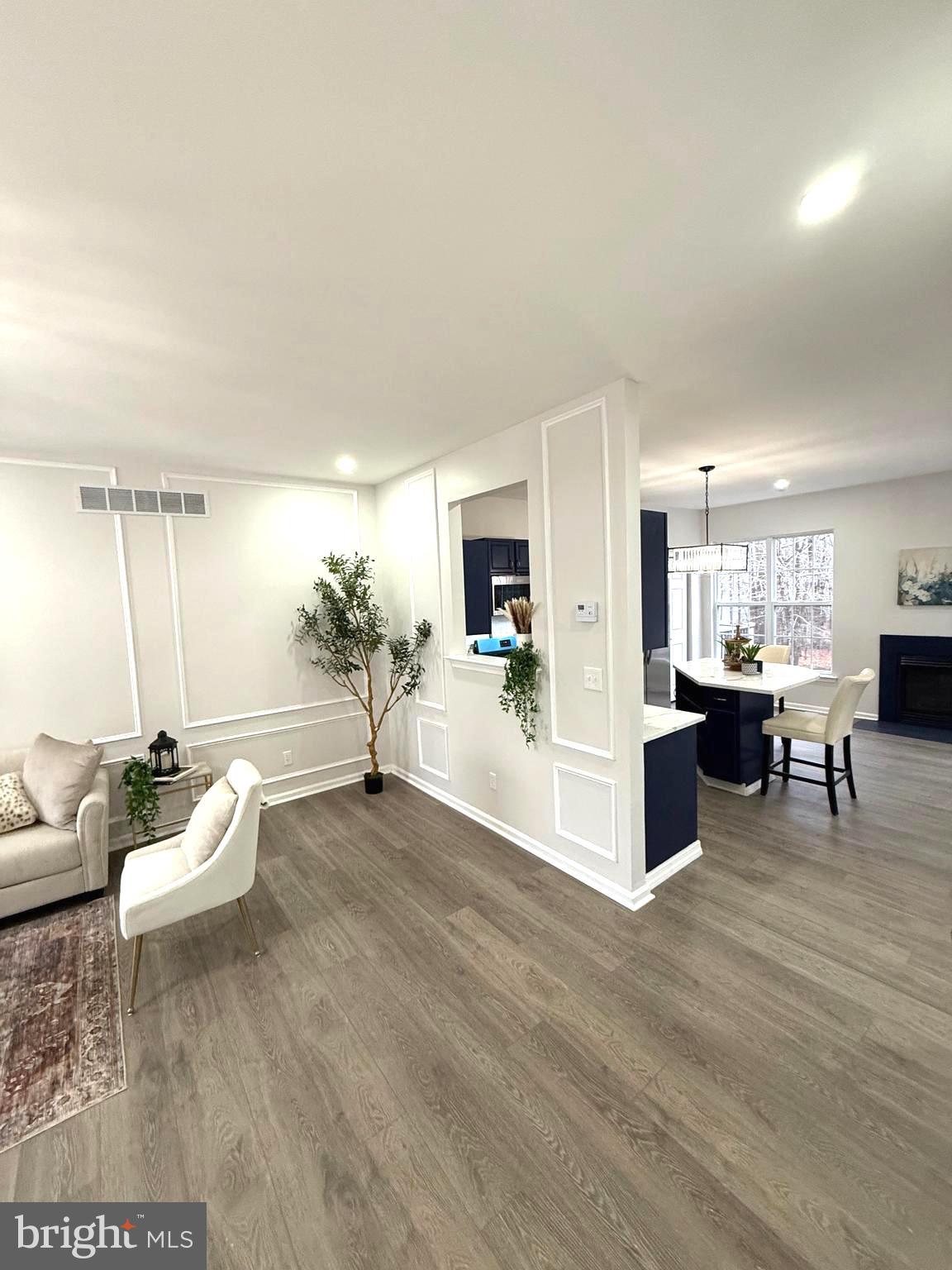 247 Becks Woods Drive Bear, DE 19701 - Photo 6 of 58 a living room with furniture and view of kitchen