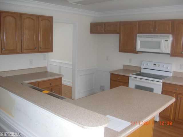 8040 Pritchett Road Browns Summit, NC 27214 - Photo 5 of 10 Kitchen.