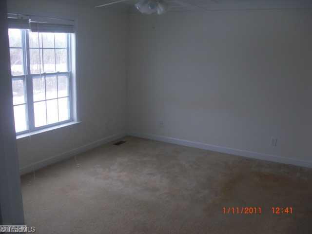 8040 Pritchett Road Browns Summit, NC 27214 - Photo 7 of 10 Master Bedroom.
