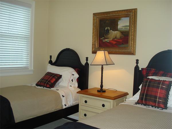 34 Courtyard Place, Unit B Lexington, MA 02420 - Photo 14 of 19 a bedroom with a bed and a lamp on dresser