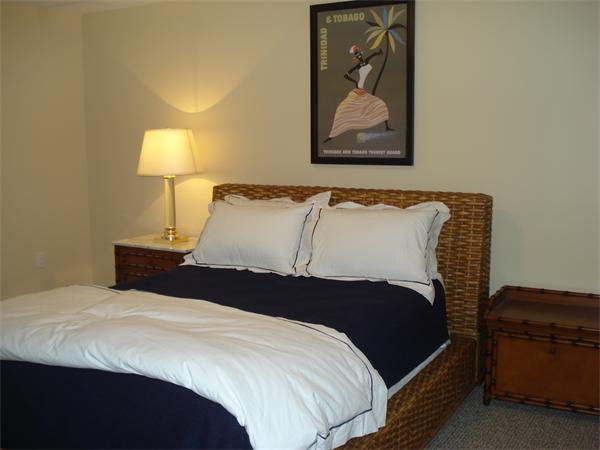 34 Courtyard Place, Unit B Lexington, MA 02420 - Photo 16 of 19 a bedroom with a bed and a lamp