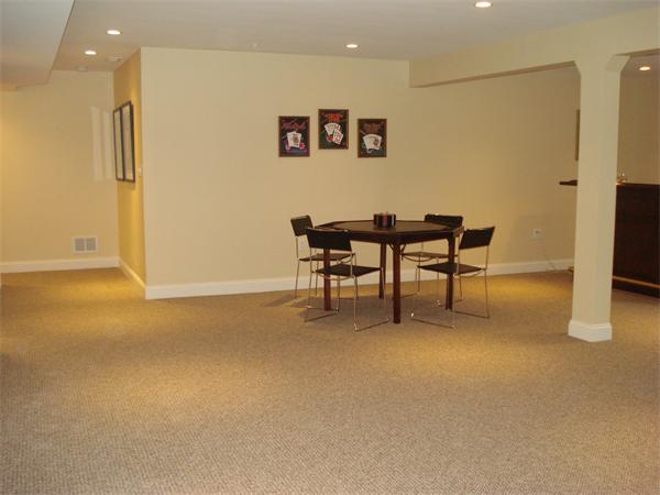 34 Courtyard Place, Unit B Lexington, MA 02420 - Photo 18 of 19 a work room with furniture and a table