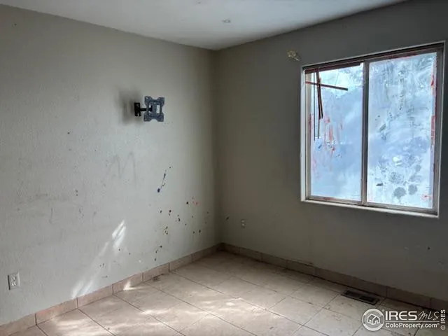 an empty room with closet