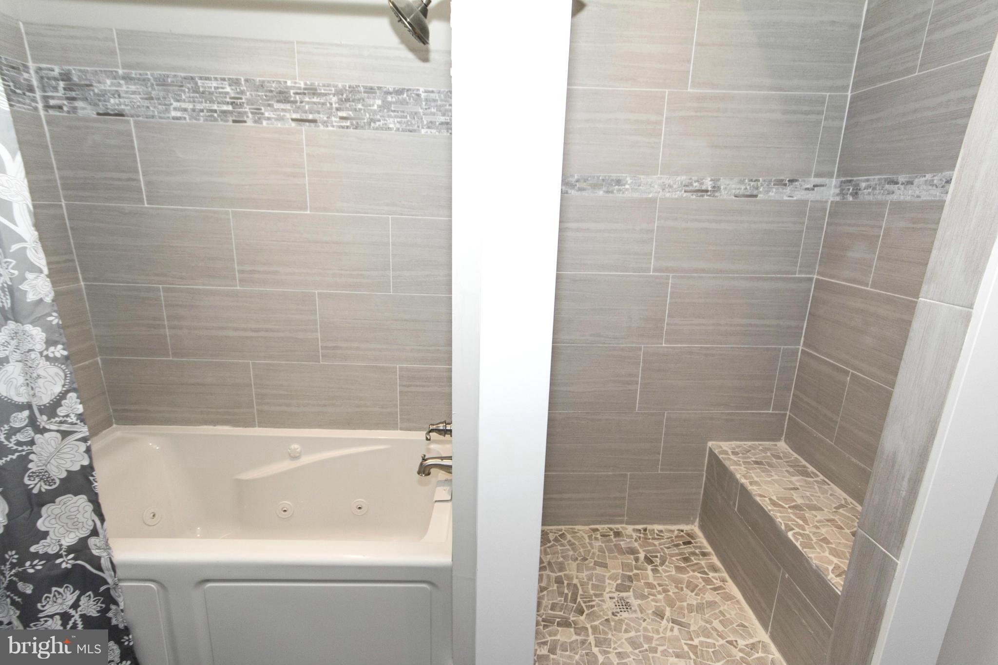 4430 Raspe Avenue Baltimore, MD 21206 - Photo 19 of 26 Master with separate shower and tub